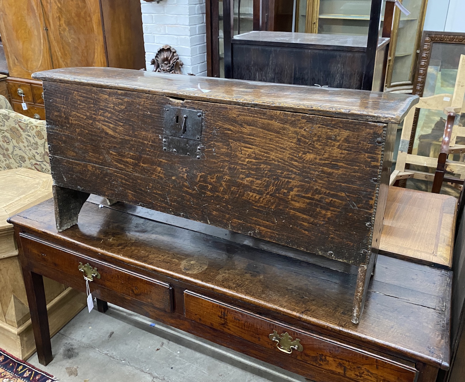 A late 17th century Sussex oak six plank coffer, length 122cm, depth 39cm, height 61cm